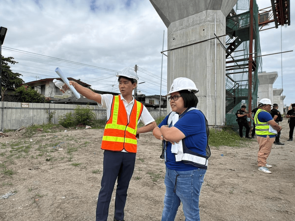 Transportation Assistant Secretary for Right-of-Way and Site Acquisition IC Calaguas and JICA Senior Deputy Director Murakami Kota inspected one of the NSCR segment's construction sites last week to monitor the progress of the project./Contributed photo
