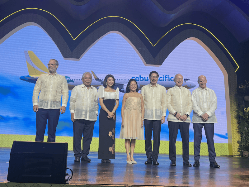 Cebu Pacific celebrates landmark Airbus order on Oct. 3, 2024. From left: Benoît de Saint-Exupéry, EVP sales of the commercial aircraft business at Airbus; Transportation Secretary Jaime Bautista; Tourism Secretary Ma. Christina Frasco; First Lady Liza Araneta Marcos; Cebu Pacific chair Lance Gokongwei; Cebu Pacific CEO Michael B. Szucs; and  Pratt and Whitney president for commercial engines Rick Deurloo./Photo by Miguel R. Camus 