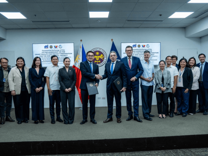 Trade Secretary Cristina A. Roque and Finance Secretary Frederick D. Go join representatives from the World Bank and KfW Development Bank during the ceremonial exchange of the grant facility for the SME COMPETE+ Project, which will help prepare the initiative for full implementation. | Contributed photo