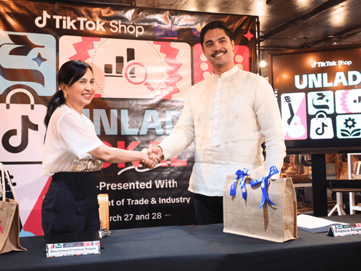 Trade Secretary Cristina A. Roque and TikTok Shop marketing lead Franco Aligaen/ Photo from DTI