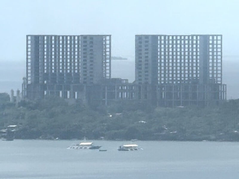 The unfinished Emerald Bay project in Mactan, Cebu, a casino dream left behind after years of financial strain and failed rescue attempts./Photo by Miguel R. Camus