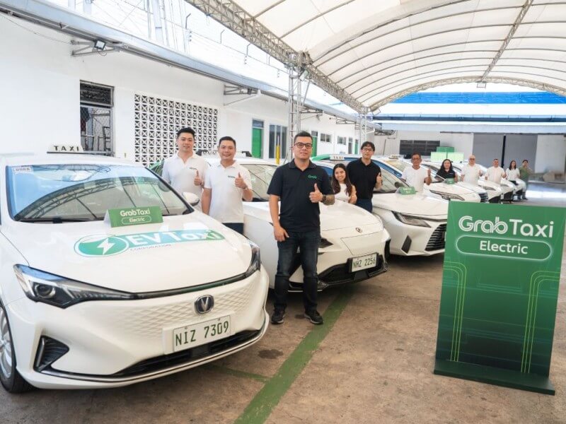 Representatives of the seven Filipino EV taxi operators activated on GrabTaxi Electric. The partnership puts hundreds of locally-owned electric taxis on the Grab platform, offering commuters a more sustainable alternative as fuel prices climb. | Contributed photo