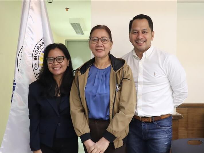 PLDT Global junior manager Charmaine Macatangay, DMW Undersecretary Dominique "Nikki" Rubia-Tutay, and PLDT Global VP and head of strategic partnerships Jojo Quiamas at the workshop for DMW frontliners. | Photo from PLDT