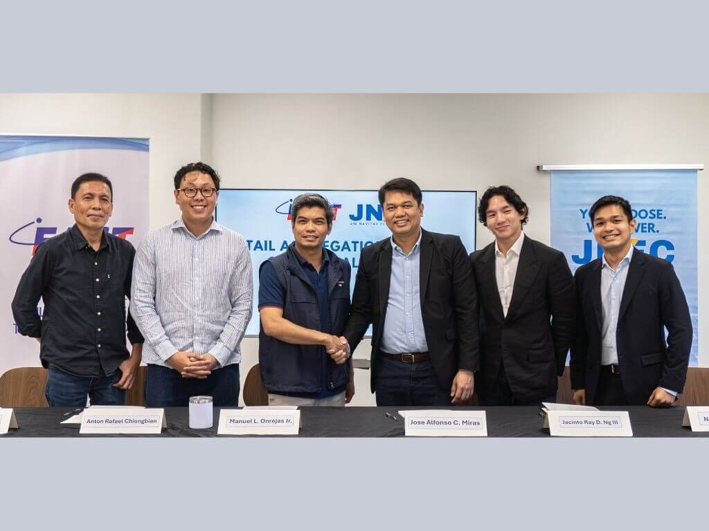 &nbsp;From left: Signing the Retail Aggregation Program agreement are Maxwell Quilat, Fast Autocore chief operating officer; Anton Rafael Chiongbian, FAST Logistics AVP for customer revenue strategy and digital transformation; Manuel Onrejas, Jr., FAST Logistics CEO for logistics; Jose Alfonso Miras, JNEC president and CEO; Jacinto Ray Ng III, SOLARIS chief operating officer; and Neo Jade de Guzman, JNEC retail operations head. | Contributed photo