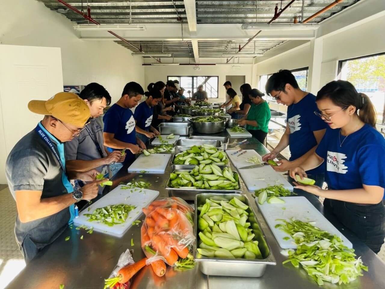 Filinvest employees actively volunteer at Loaves X Fish, coming together on weekends to help prepare meals for beneficiaries. | Contributed photo