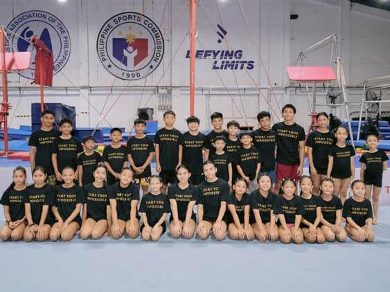 Yulo with the gymnastics camp participants from all over the country during the awarding ceremony./Photo from TMP