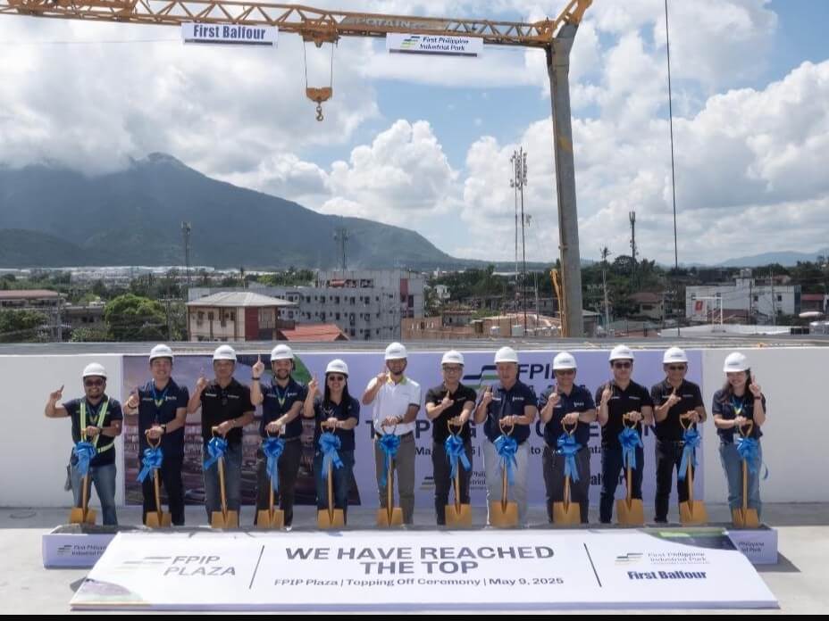 Executives and project team members from FPIP and First Balfour at the topping off ceremony./ Contributed photo