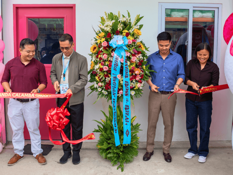 foodpanda Philippines executives Rodeo Jumarang, Joseph Wijesekera, and Mary Anne Ting with Jake Flores from the Office of the City Mayor of Calamba. | Contributed photo