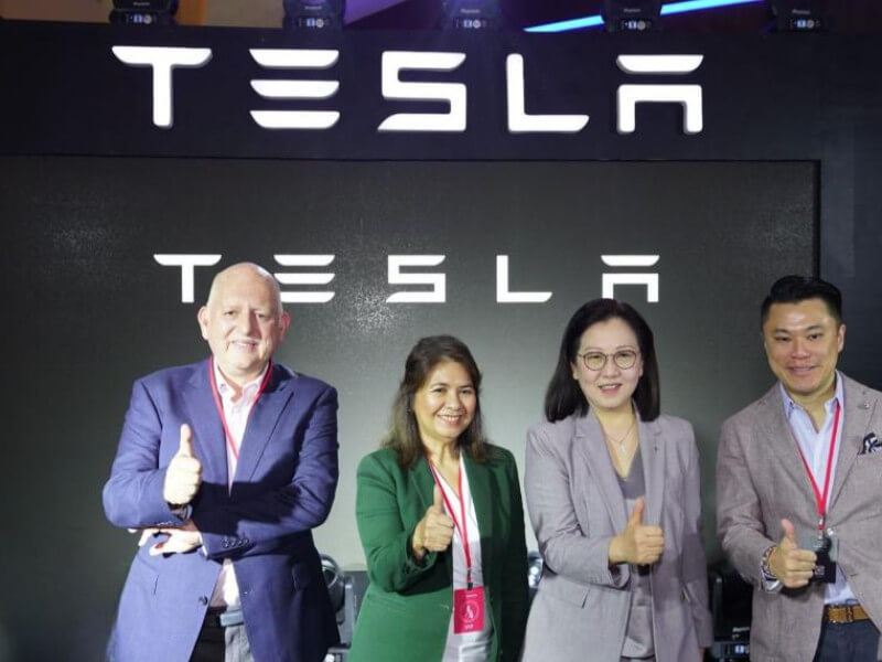 Tesla launches in the Philippines at Uptown Parade, Taguig on Nov. 8, 2024. Present at the debut were Graham Coates, FVP and head of Megaworld Lifestyle Malls; Lourdes Gutierrez-Alfonso, president of Megaworld; Isabel Fan, Tesla SEA director; and Kevin Tan, president and CEO of Alliance Global Group, the parent company of Megaworld./ Photo from Megaworld 