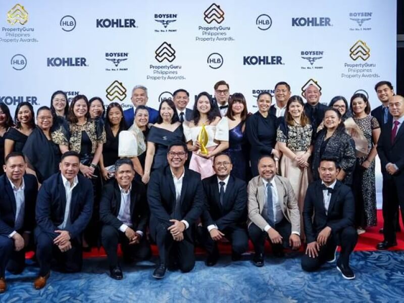 Executives and representatives from SM Prime celebrate the company’s wins at the 13th PropertyGuru Philippines Property Awards, recognizing projects across Batangas, Metro Manila and SMDC developments, along with the Rising Star Award for Jessica Bianca T. Sy./Photo from SM Prime (Click to view full image)