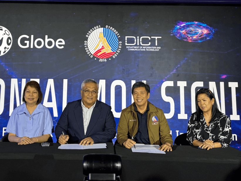 (From left) Globe chief sustainability and corporate communications officer Yoly Crisanto and president and CEO Carl Cruz with and Information and Communications Technology Secretary Henry Aguda and Usec. Christina Faye Condez at the signing of the MOU./Contributed photo