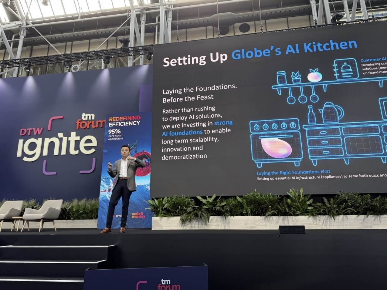 Globe's Chief AI Officer Anton Bonifacio on stage at DTW Ignite 2025, sharing insights on the company's human-centric approach to AI.