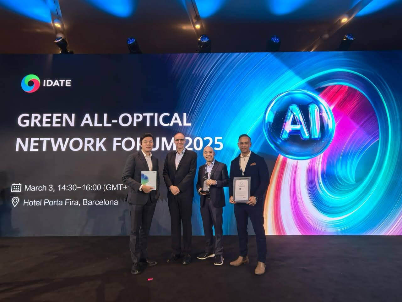 James Lim, Globe VP for broadband access planning and engineering (3rd from left), and Danny Theseira, Globe senior advisor (4th from left) receive the award for Excellent All-Optical Network for AI Enablement at the Green All-Optical Network Forum 2025 during MWC. /Photo from Globe