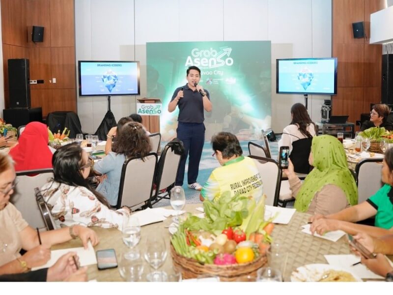 ITC-Digital PINAS Digitalization Business advisor Kim Sinchioco leads a session at the Grab Asenso Learning Caravan in Davao City, guiding women farmer-entrepreneurs from the Rural Improvement Club (RIC) Davao City Federation Inc. on branding, content strategy, and digital content planning. | Contributed photo