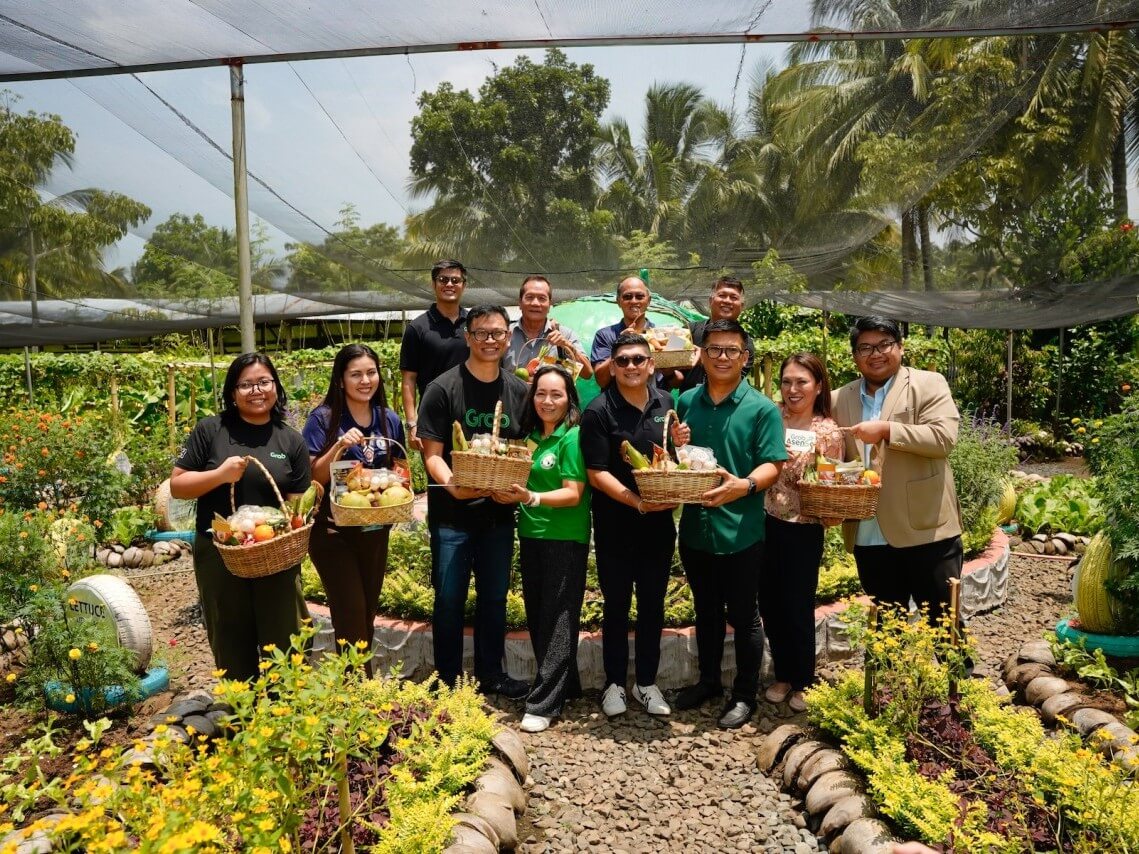 Grab Philippines vice president for Cities RJ Cabaluna [third from left] leads the MOA signing with RIC-Davao president JosieOsorio [center], witnessed and supported by representatives from the Davao City Council, City Agriculturist&rsquo;s Office, and Davao City Economic Enterprises.| Contributed photo