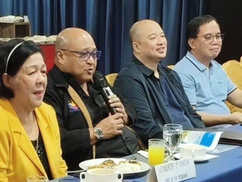 GSIS President and General Manager Wick Veloso addresses members of the Philippine Alliance of Retired Educators (PARE)-Mindanao chapter in General Santos City. With Veloso are PARE vice president for Mindanao Leonorita Pineda, GSIS EVP for core business Jason Teng, and SVP for Visayas and Mindanao Isagani del Rosario./Photo from GSIS