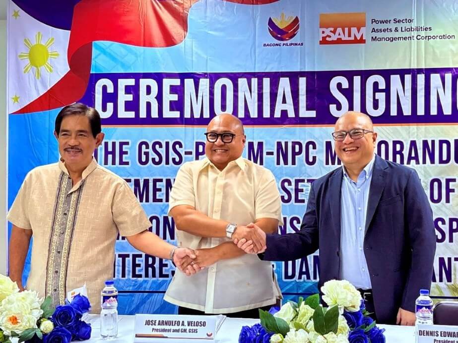 With shared commitment, GSIS, PSALM, and NPC work hand-in-hand to resolve a long-standing issue with compassion and integrity. GSIS President and General Manager Wick Veloso (center) with NPC president and CEO Fernando Martin Roxas and PSALM president and CEO Dennis Edward Dela Serna./ Contributed photo