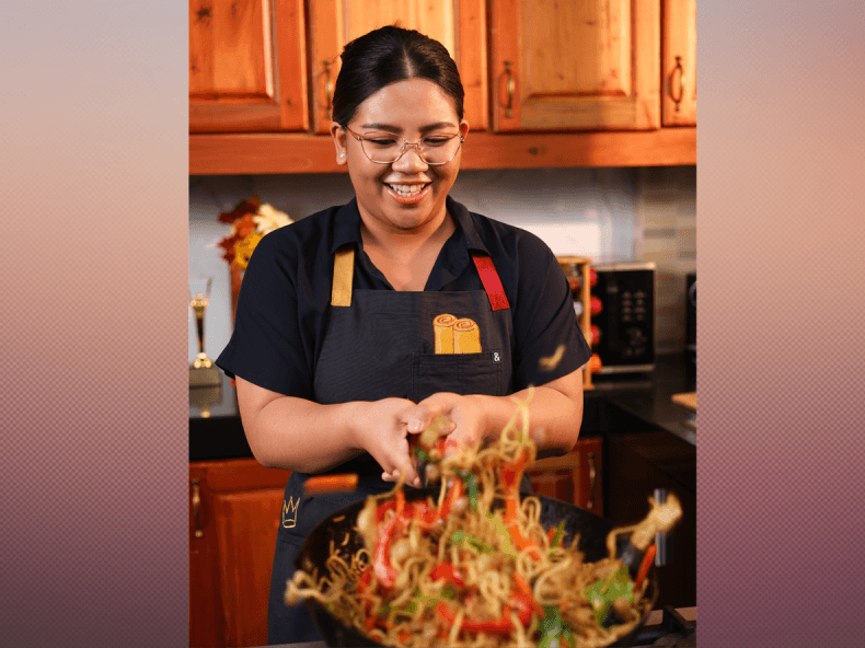 Marquez demonstrates the culinary content that has earned her a global following, wearing the Hedley & Bennett apron created through the brand's first collaboration with a Filipino food content creator. | Contributed photo