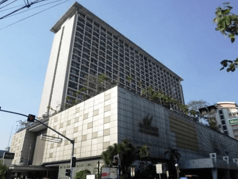 The 22-story Waterfront Manila Hotel and Casino, formerly known as the Manila Pavilion Hotel, stood as a historic landmark near Rizal Park before the tragic 2018 fire that claimed six lives and prompted extensive renovations ahead of its planned phased reopening in 2026./Image from ​Memories of Old Manila & ​Beyond Facebook account 