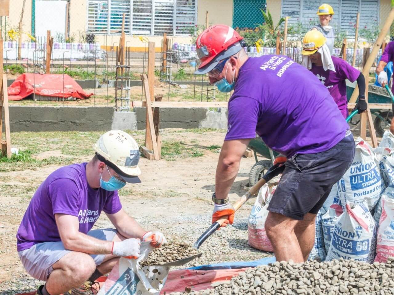 Home Credit Philippines employees volunteer alongside All Hands & Hearts and Happy Hearts Czech in the rehabilitation of Salvacion Elementary School in Caramoran, Catanduanes, helping restore classrooms and support students through community rebuilding and mental health activities following typhoon damage. | Contributed photos