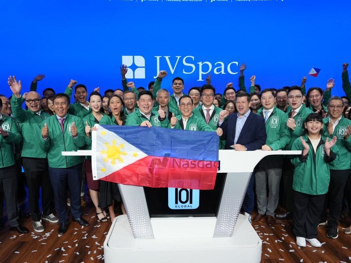The Hotel101-JVSpac team, led by Edgar "Injap" Sia II and Tony Tancaktiong display the Philippine flag right after the opening bell at the Nasdaq headquarters in New York, Friday, July 27, 2025./Contributed Photo