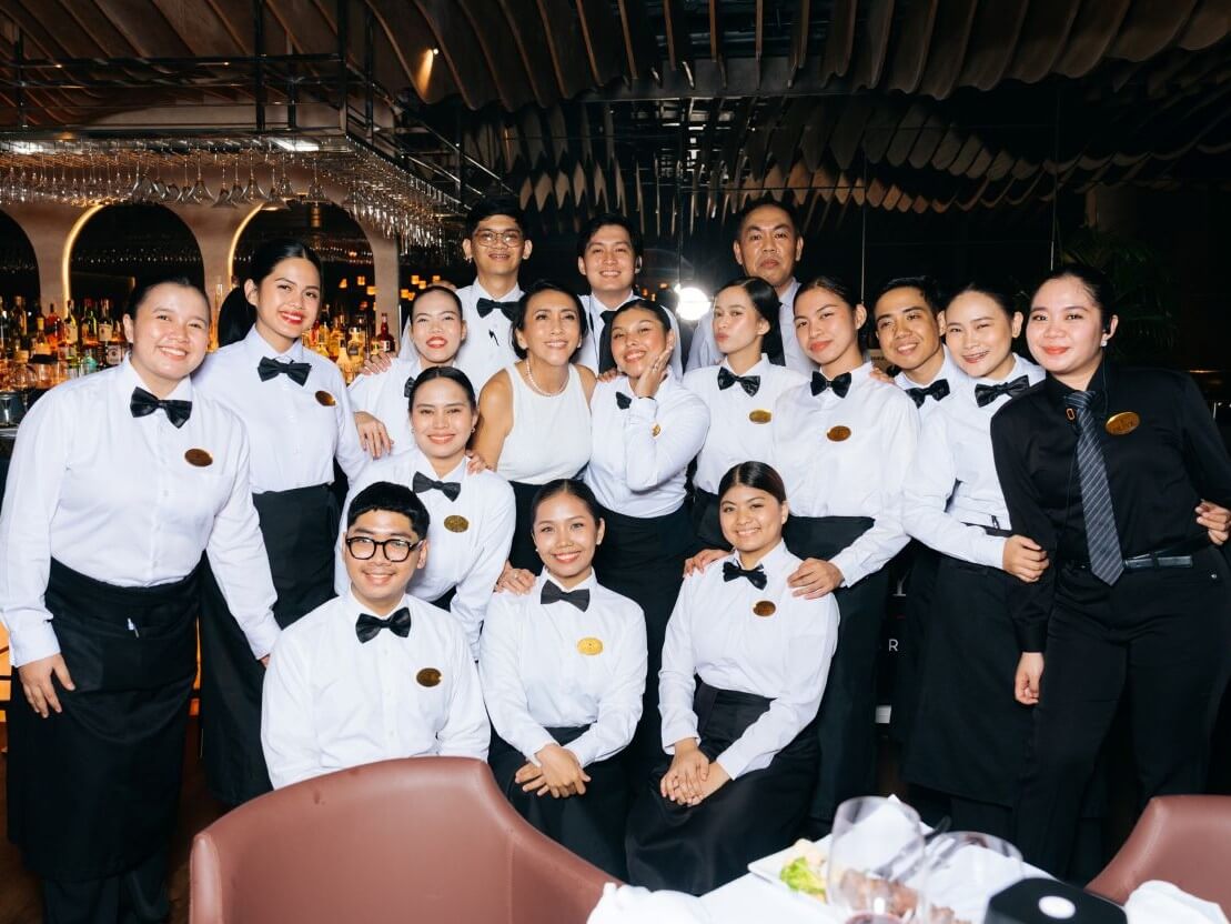House of Wagyu founder Corinne Casta&ntilde;eda with her team at House of Wagyu Stonegrill Okada Manila.| Contributed photo