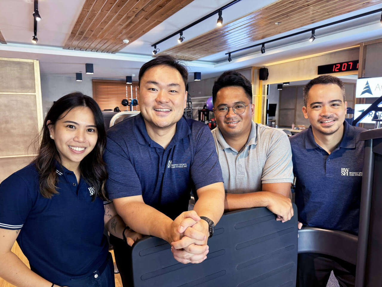 Bigway Sports' core team, (from left) marketing head Andi del Rosario, Sze, strength and conditioning specialist Coach Luis, and sales director Jose Gemora./contributed photo