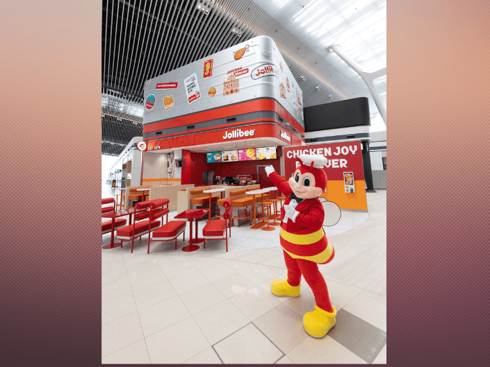 Jollibee&rsquo;s new store at Hong Kong International Airport Terminal 2 marks the brand&rsquo;s first airport location in Hong Kong, underscoring its strategy to expand through high-traffic global travel hubs. Designed around a travel theme, the storefront resembles a giant suitcase adorned with destination-inspired visuals reflecting Jollibee&rsquo;s growing international presence. | Contributed photo
