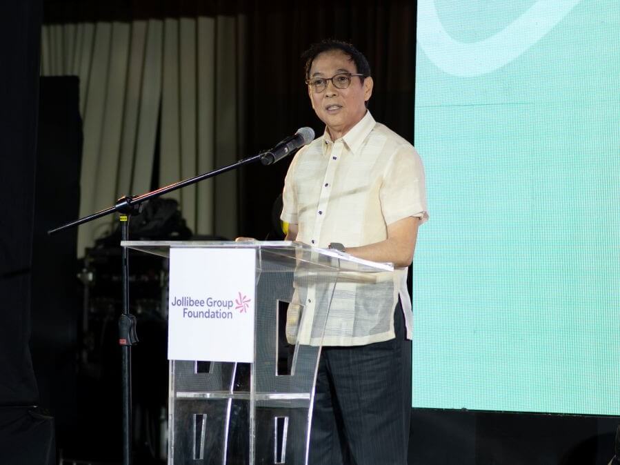 Dr. Tony Tan Caktiong, co-founder and executive chairman of the Jollibee Group and chairman emeritus of the Jollibee Group Foundation, delivers his keynote message during the Foundation&rsquo;s 20th Anniversary celebration, reflecting on two decades of partnerships and community impact. | Contributed photo