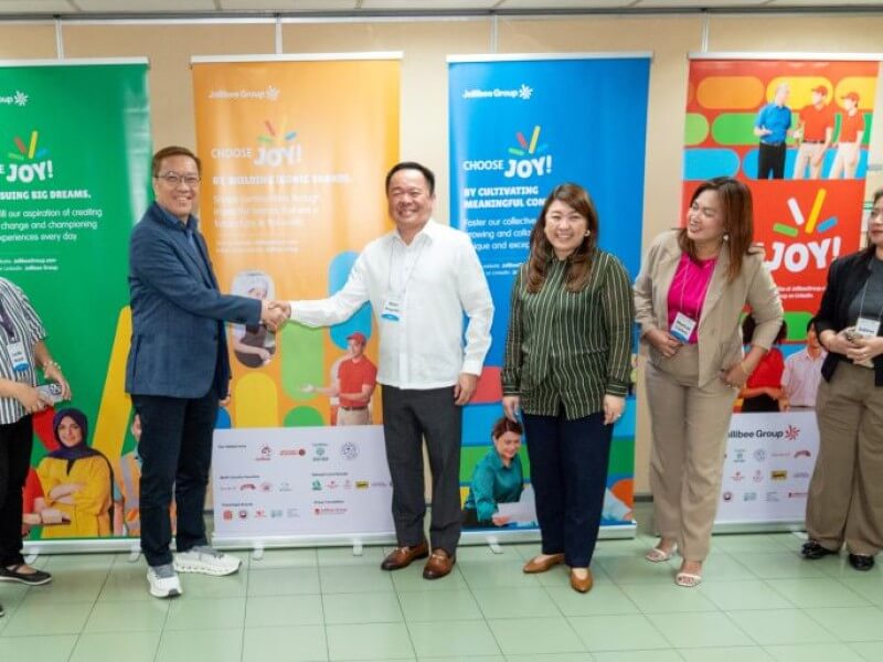 Joseph Tanbuntiong (3rd from left), CEO of Jollibee Group Philippines and head of Jollibee Global, and Department of Education Director Marc Magsalin (5th from right) lead the launch of the Jollibee Group&ndash;DepEd partnership to co-develop a senior high school quick service restaurant curriculum and work immersion program aimed at strengthening employability and aligning education with industry needs. | Contributed photo