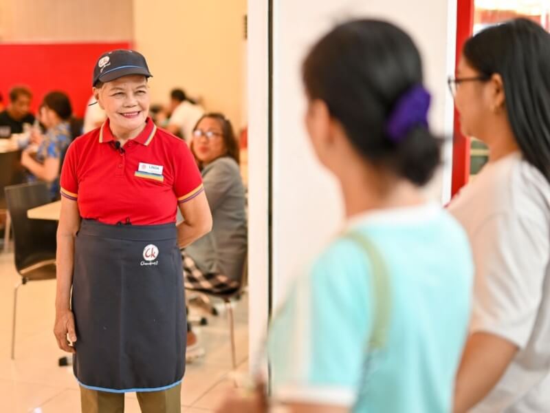 Qualified senior citizens and persons with disabilities support customers and store teams across participating Jollibee Group brands. The Cebu City partnership extends these employment opportunities to the Visayas. | Contributed photo