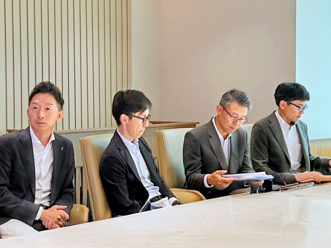  A KEA delegate listens intently to the speaker as fellow participants read reference materials shared by BDO during their visit./ Contributed photo