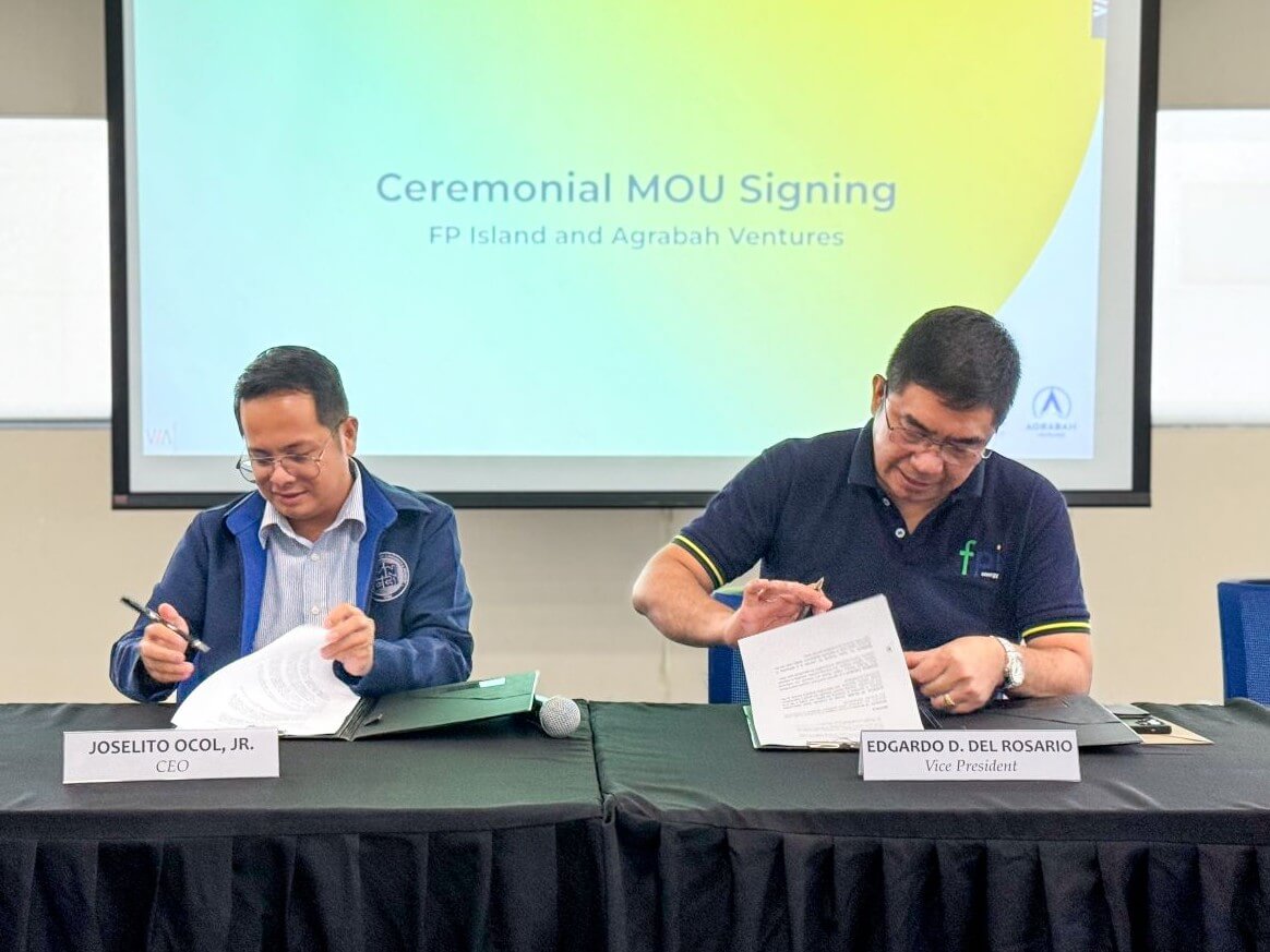 Agrabah Ventures CEO Joselito Ocol Jr. (left) and FP Island vice president Edgardo del Rosario sign the MOU for their companies’ collaboration to help uplift the lives of residents in several remote and off-grid islands in Caramoan and Garchitorena towns in Camarines Sur, where FP Island operates. | Contributed photo