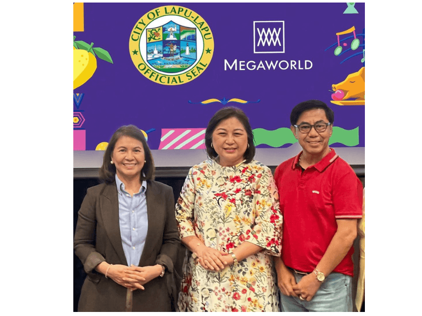 Megaworld president and CEO Lourdes Gutierrez-Alfonso is joined by Lapu-Lapu City Mayor Cynthia King-Chan and her husband, Lapu-Lapu City Lone District Rep. Junard &ldquo;Ahong&rdquo; Chan. | Contributed photo