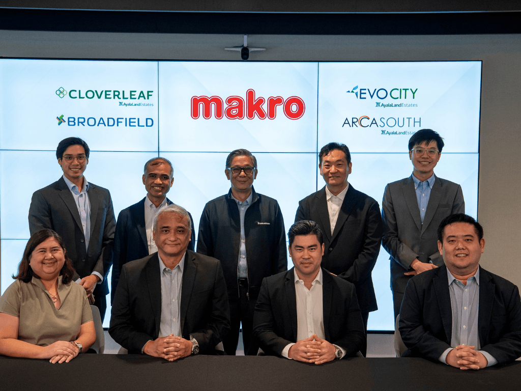 Ayala and Makro officials after the deal for the four new developments were sealed./Contributed Photo