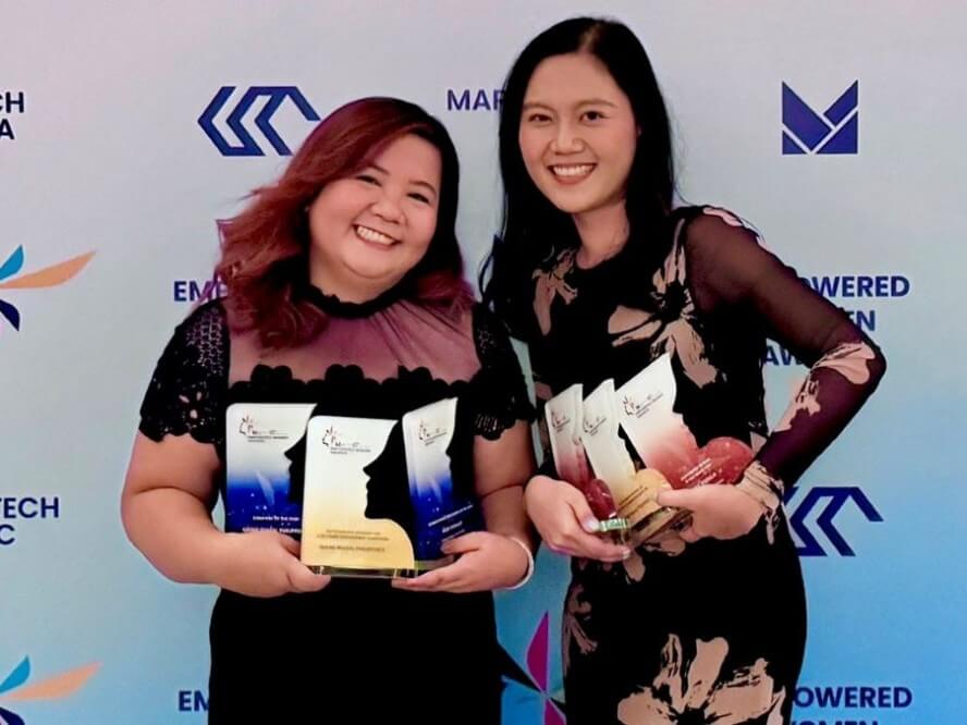 (From left) RJ Rodillo-digital and PR director, and Dezza Alvarez-digital content and community relations manager, bring home top honors at the Empowered Women Awards. | Contributed photo