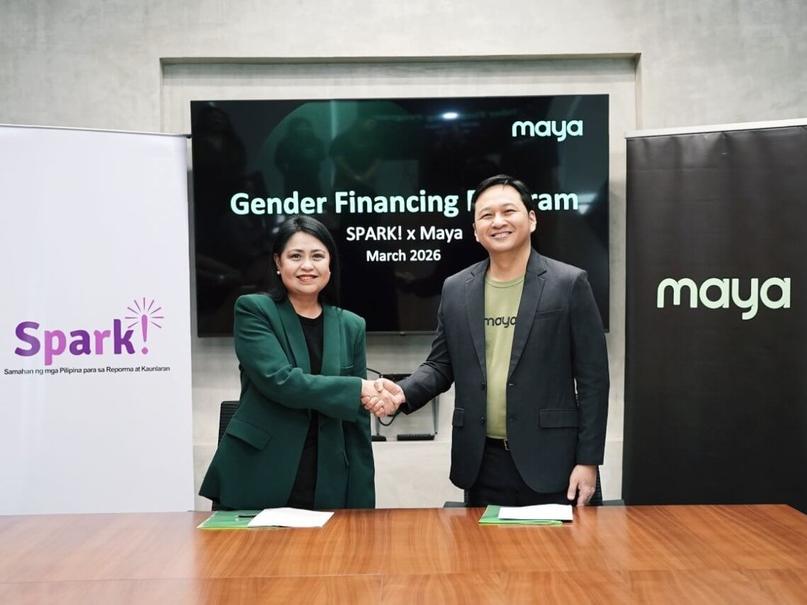 Maya and SPARK! Philippines formalize their partnership to support women micro-entrepreneurs, with SPARK! Philippines executive director Maica Teves and Maya head of Corporate Affairs Toff Rada leading the agreement signing. | Contributed photo