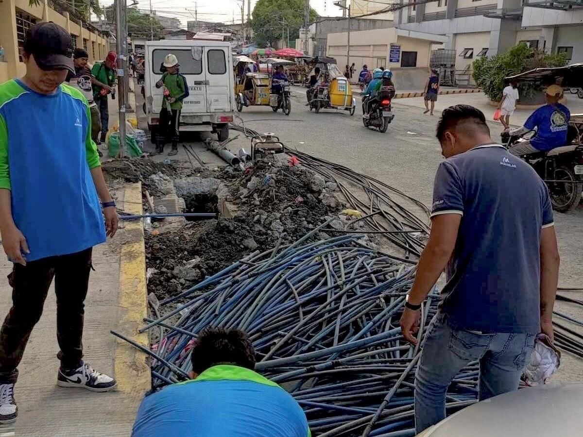  Maynilad personnel remove illegal connections during the company’s intensified crackdown on unauthorized water use. From January 2024 to August 2025, Maynilad regularized some 14,000 delinquent accounts—recovering lost water and improving supply for legitimate customers./Contributed photo