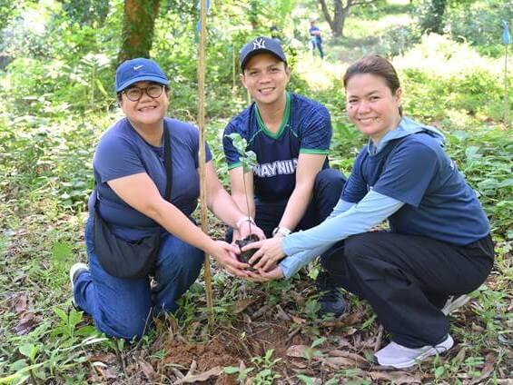 Maynilad employee volunteers plant indigenous tree seedlings during the kickoff of the 2026Plant for Life program in the Ipo Watershed. The program targets 230,225 seedlings across 450 hectares this year, supporting Maynilad&rsquo;s continuing efforts to restore and protect critical watershed areas. | Contributed photo