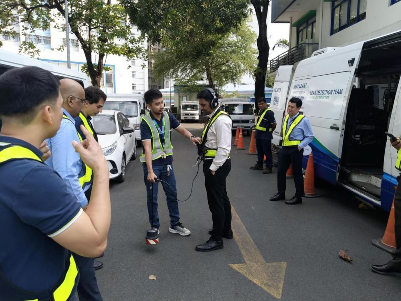 Saurabh Singh (center, in white), Deputy Secretary of India&rsquo;s Department of Economic Affairs, tries Maynilad&rsquo;s acoustic leak detection equipment during a benchmarking visit facilitated by the Maynilad Water Academy and supported by the Asian Development Bank. The delegation observed Maynilad&rsquo;s non-revenue water (NRW) management. and leak detection operations as part of discussions on possible future knowledge-sharing and capacity-building initiatives.| Contributed photo