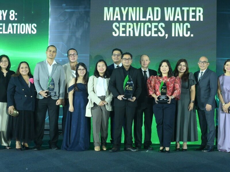 The Maynilad team celebrates its five wins at the 21st Philippine Quill Awards for outstanding communication initiatives. Joining the group were members of the company’s top management Engr. Ronald Padua, water supply operations head; Martin De Guzman, human resources head; Marie Antonette De Ocampo, corporate affairs and communication head, and Engr. Ryan Jamora, central non-revenue water head./Contributed photo (Click to view full image)
