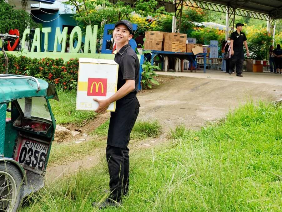 Aside from reclassified chairs and tables and cleaning materials, McDonald’s also shared meals with the hardworking teachers and community members at Catmon Elementary School./ Contributed photo