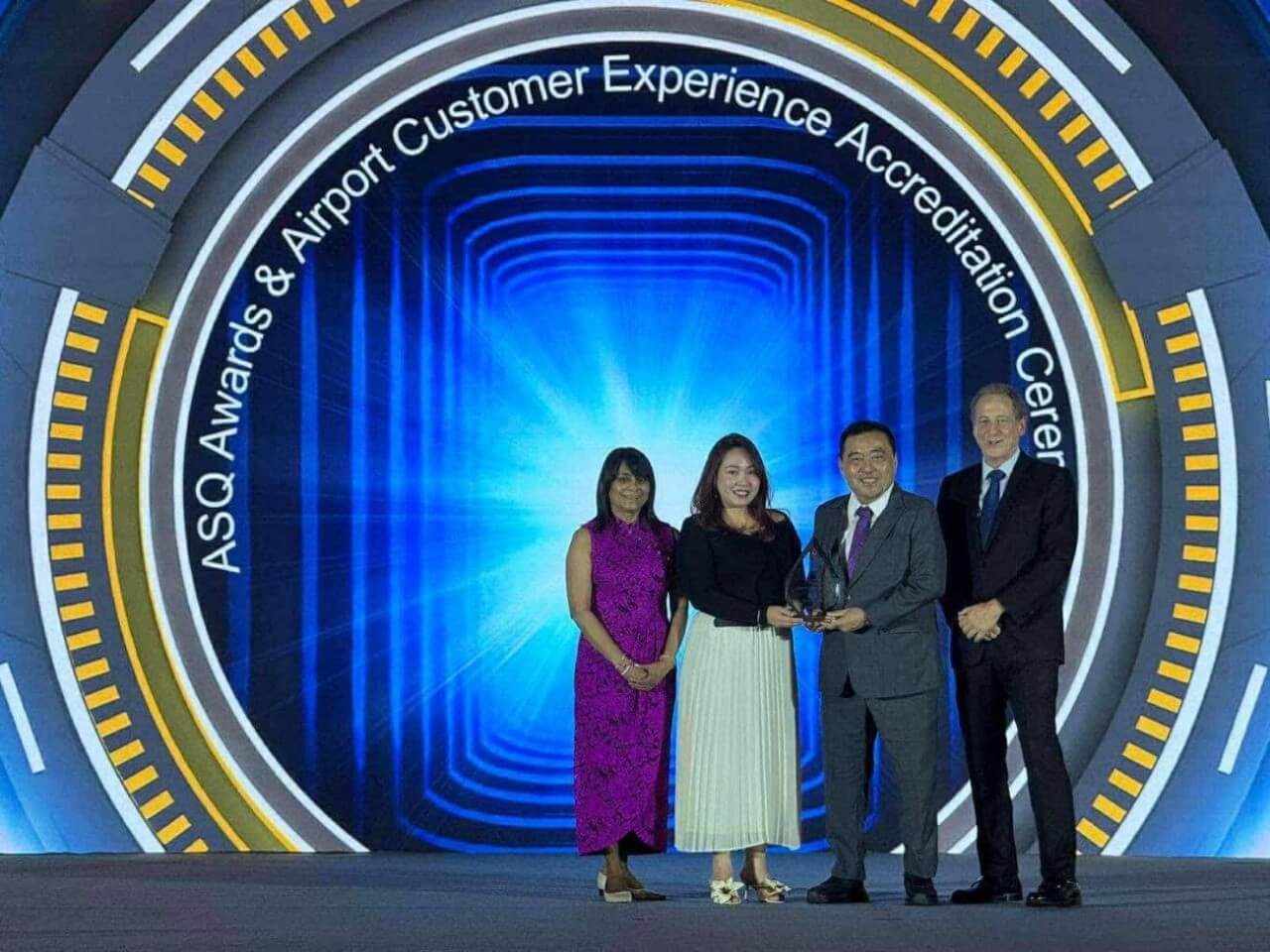 The recognition accepted by Ricia Montejo, ACAC head of reputation and customer experience (in black) and Julius Neri, Mactan Cebu International Airport Authority general manager and chief executive officer, during the Airport Experience Summit in Guangzhou, China. | Contributed photo