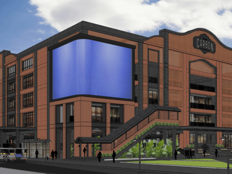Artist’s render of the Carbon Market Block 2, a world-class design featuring brick-toned finishes, industrial touches, and a massive corner LED screen, reimagined for Cebu./Image from Megawide 