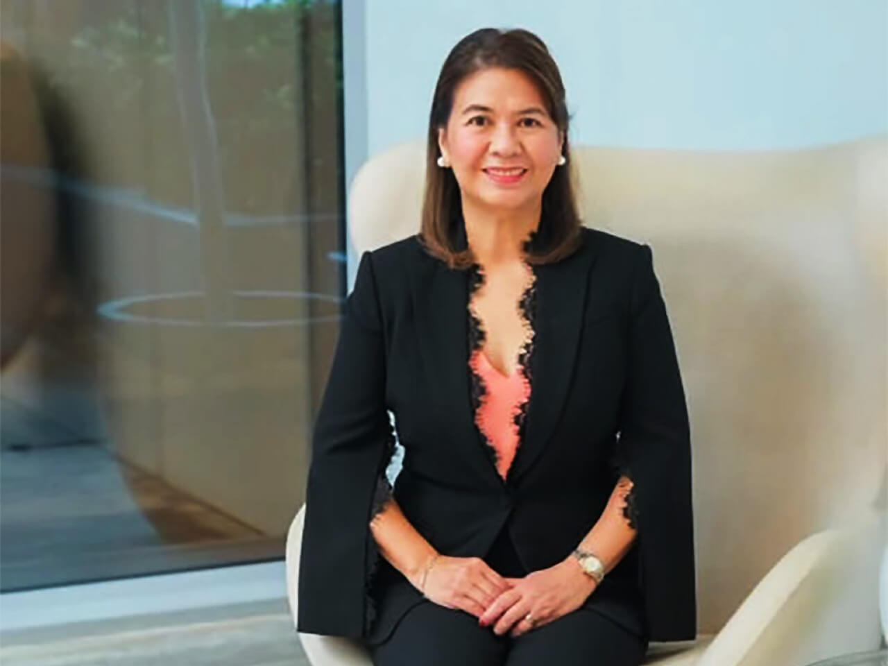 'Ms. Lou', as some company insiders call, her started as Andrew Tan's accountant in Megaworld in 1990. CLICK ON IMAGE TO SEE FULL PHOTO (Photo courtesy of Megaworld)