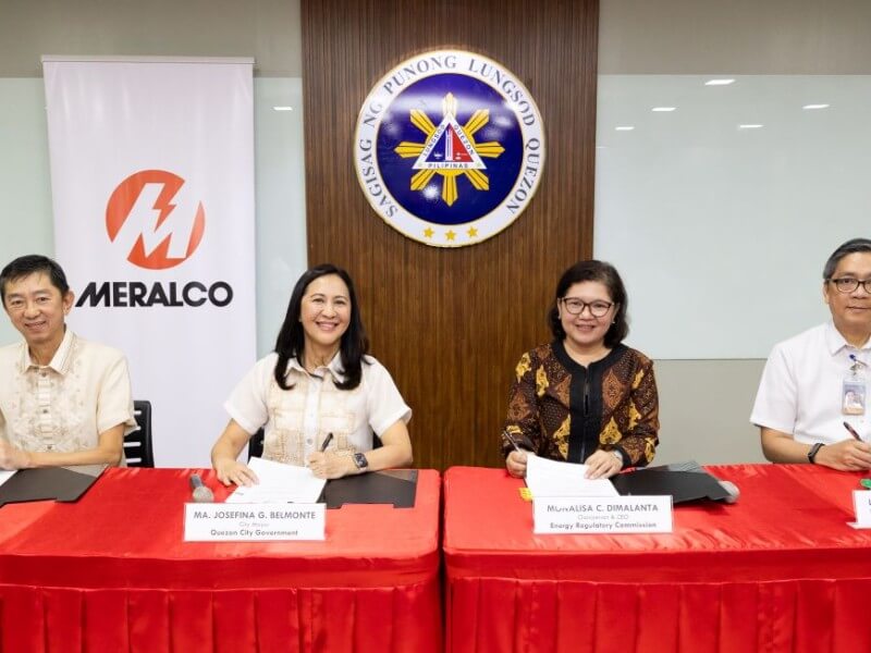(From left):  Meralco SVP and chief revenue officer Ferdinand O. Geluz, Quezon City Mayor Josefina “Joy” G. Belmonte, ERC Chair Monalisa C. Dimalanta, and Meralco VP and head of utility economics Lawrence S. Fernandez during the signing of the tripartite agreement on Aug. 4, 2025./ Photo from Meralco (Click the photo to view full image)