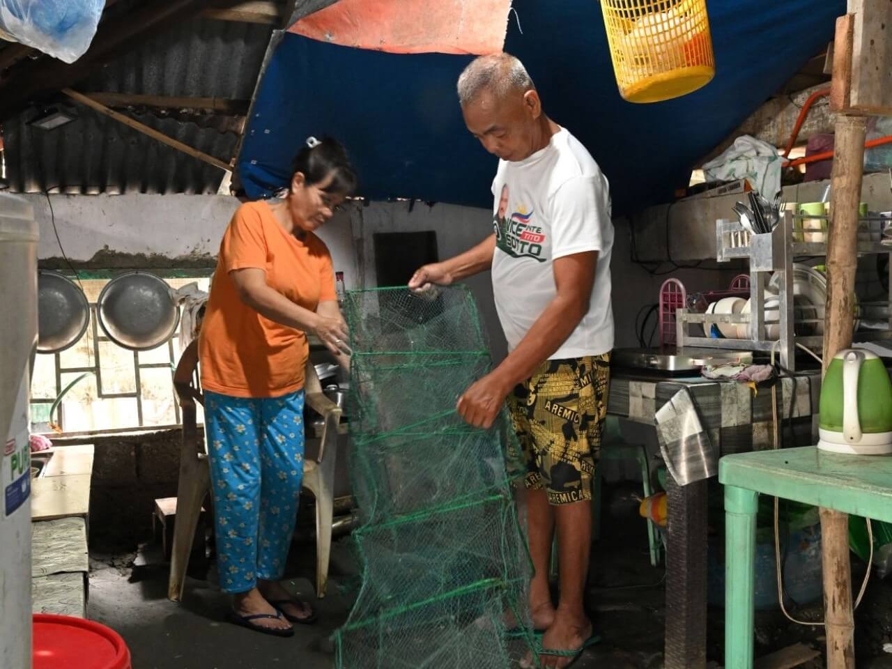 Senior citizens and fisherfolk Felino and Blesilda Fajardo, residents of Hagonoy, Bulacan's island community, finally gained access to electricity thanks to the assistance of OMF and Meralco, after enduring decades without it. | Contributed photo