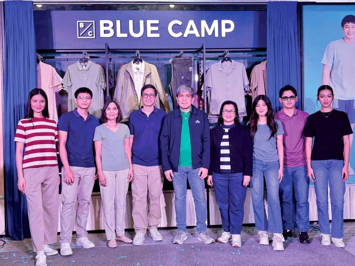 At the Blue Camp relaunch in Metro Market! Market!, MRSGI leaders (third to sixth from left) chair Sherisa P. Nuesa, business unit head for general merchandise Christopher Tiu, president & COO Joel Orense, and VP– store operations Jacqueline Cano join influencers Marcelyn Bautista, Dustine Mayores, Chloe Redondo, Jeremy Sabido, and Lariza Galvez to present the brand’s fresh new look. ​| Contributed photo