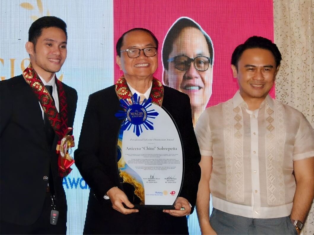 Metrobank Foundation Inc. (MBFI) president Aniceto M. Sobrepeña receives the Magis of Rotary Lifetime Distinction Award, while MBFI executive vice president Philip Francisco U. Dy is honored with the Presidential Award for Vocational Excellence. MBFI also receives the Magis of Rotary Award for Exemplary Partnership. / Contributed photo