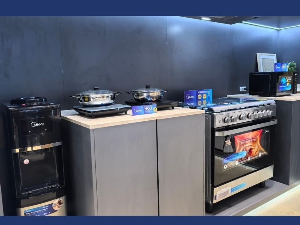 Midea&rsquo;s &ldquo;Millennial Kitchen&rdquo; showcases induction cookers and freestanding cookers with multiple burners. | Photo by Vanessa Hidalgo
